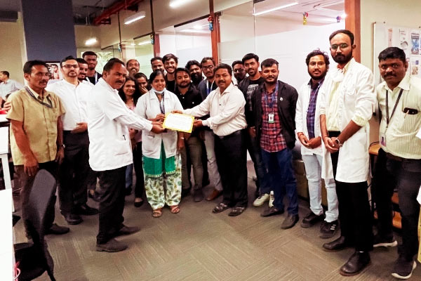 fidel josh team with blood donation certificate